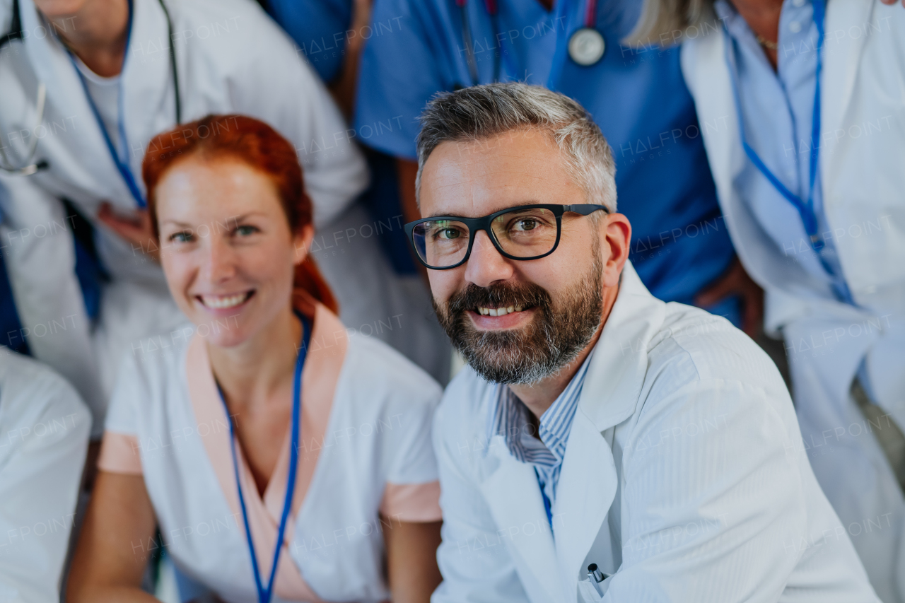 Portrait of happy doctors, nurses and other medical staff in a hospital.