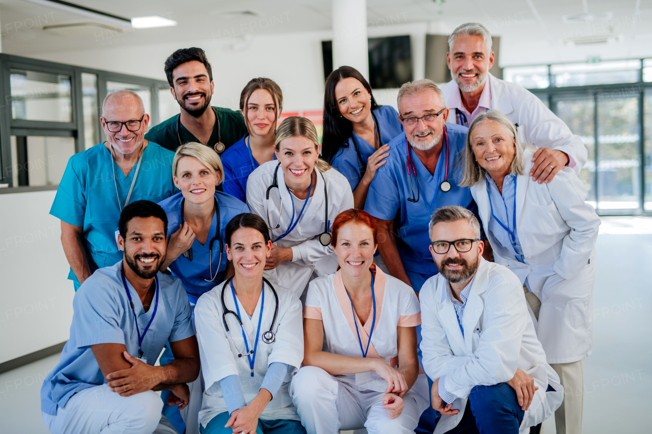 Portrait of happy doctors, nurses and other medical staff in a hospital.