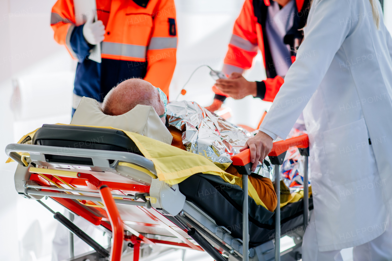 Doctor taking care of patient from a rescue ambulance.