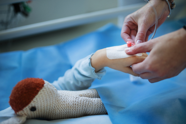 Clse-up of insertion a cannula at pediatrics.