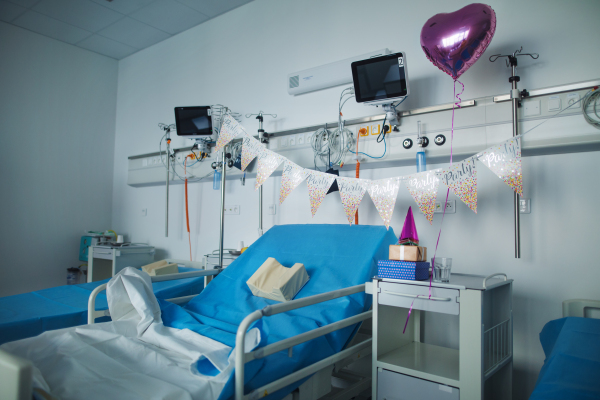 Close-up of empty hospital room with birthday decoriation.