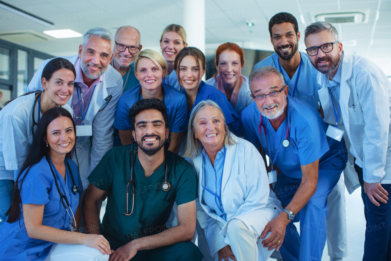 Portrait of happy doctors, nurses and other medical staff in a hospital.