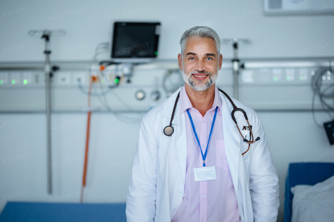 Portrait of mature doctor at a hospital room.