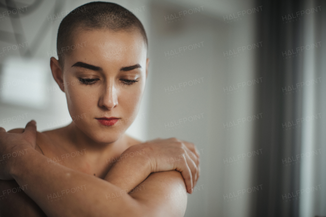 Portrait of beautiful woman, cancer awareness concept. Strong female oncology patient, determined and confident.