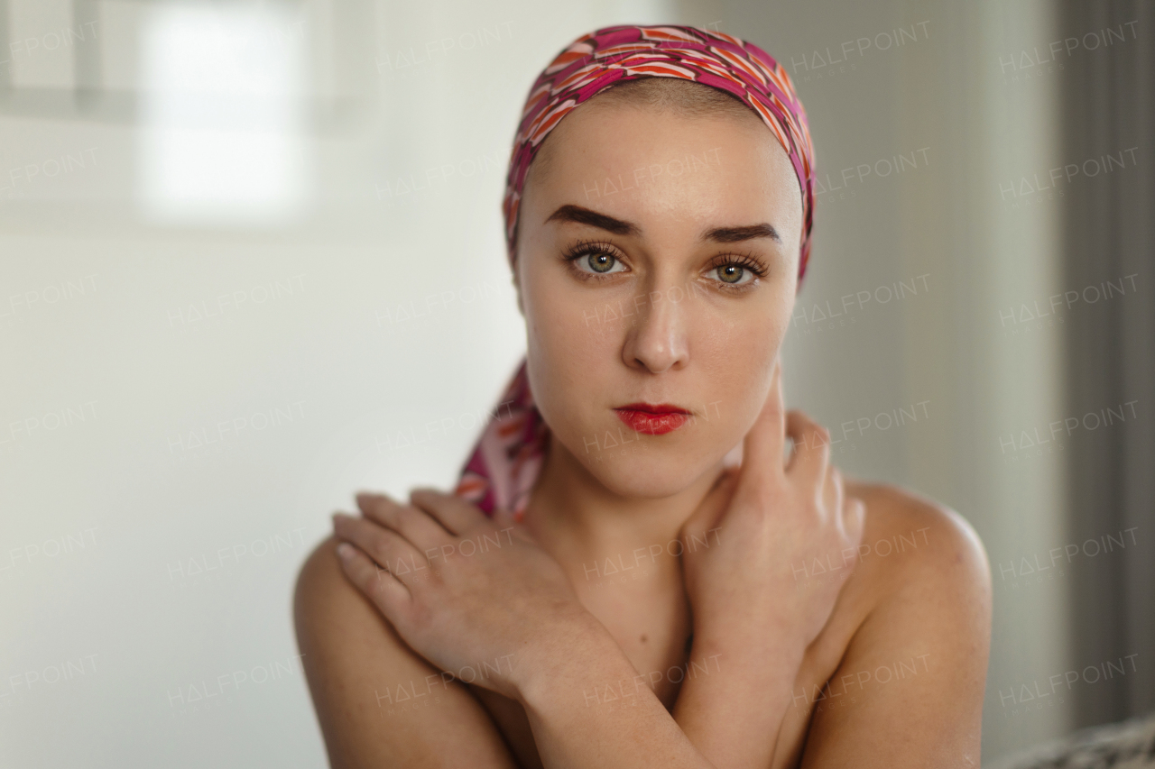 A portrait of unhappy pensive woman with cancer.