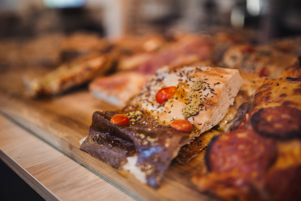 Close-up of fresh pastries in a showcase.