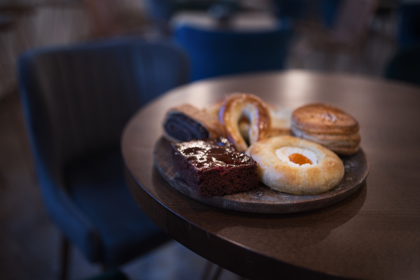 Close-up of fresh sweet pastry on the table in a cafe.