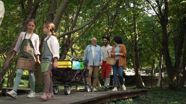 Low section video of Group of group of volunteers on their way to cleaning the forest from plastic garbage.