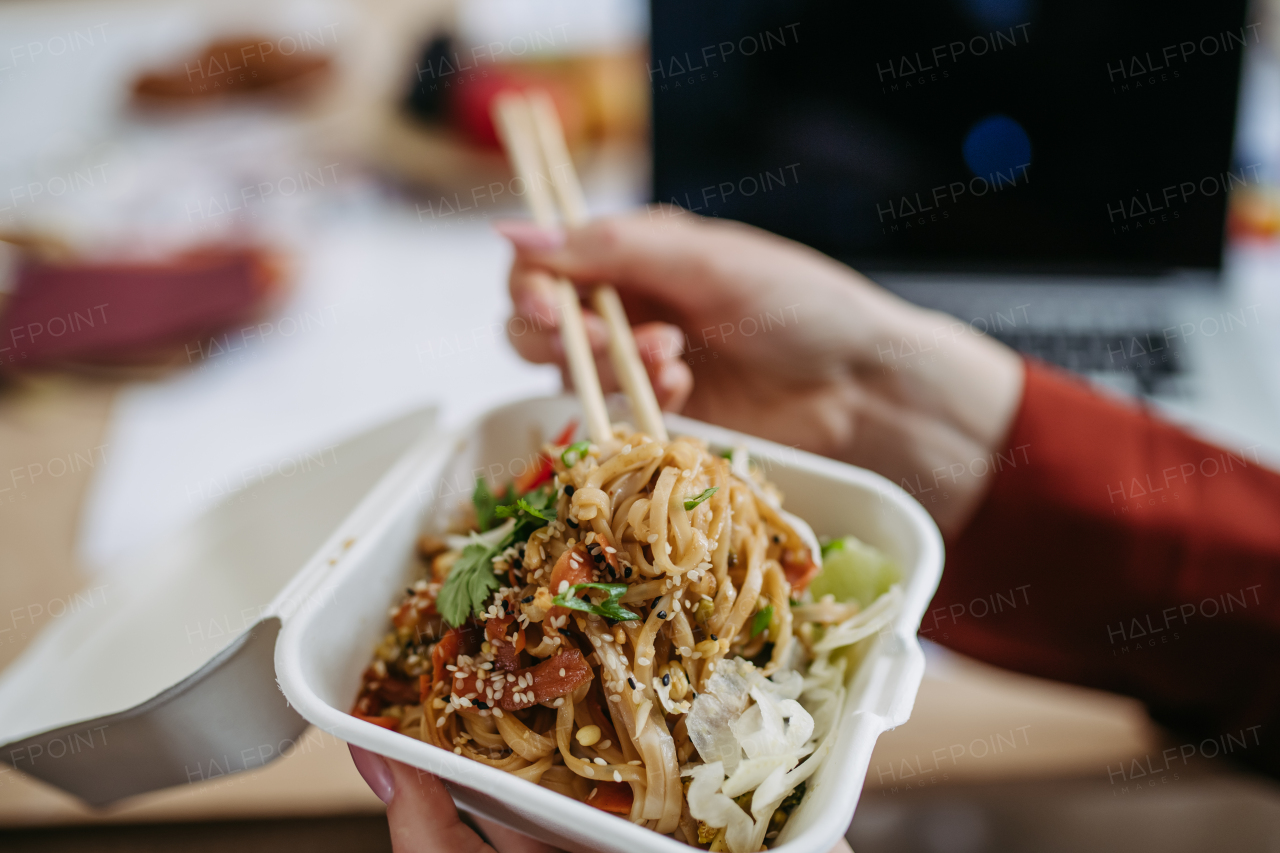 Close up of chinese food, lunch time in the office.