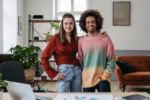 Portrait of young colleagues in their creative atelier.