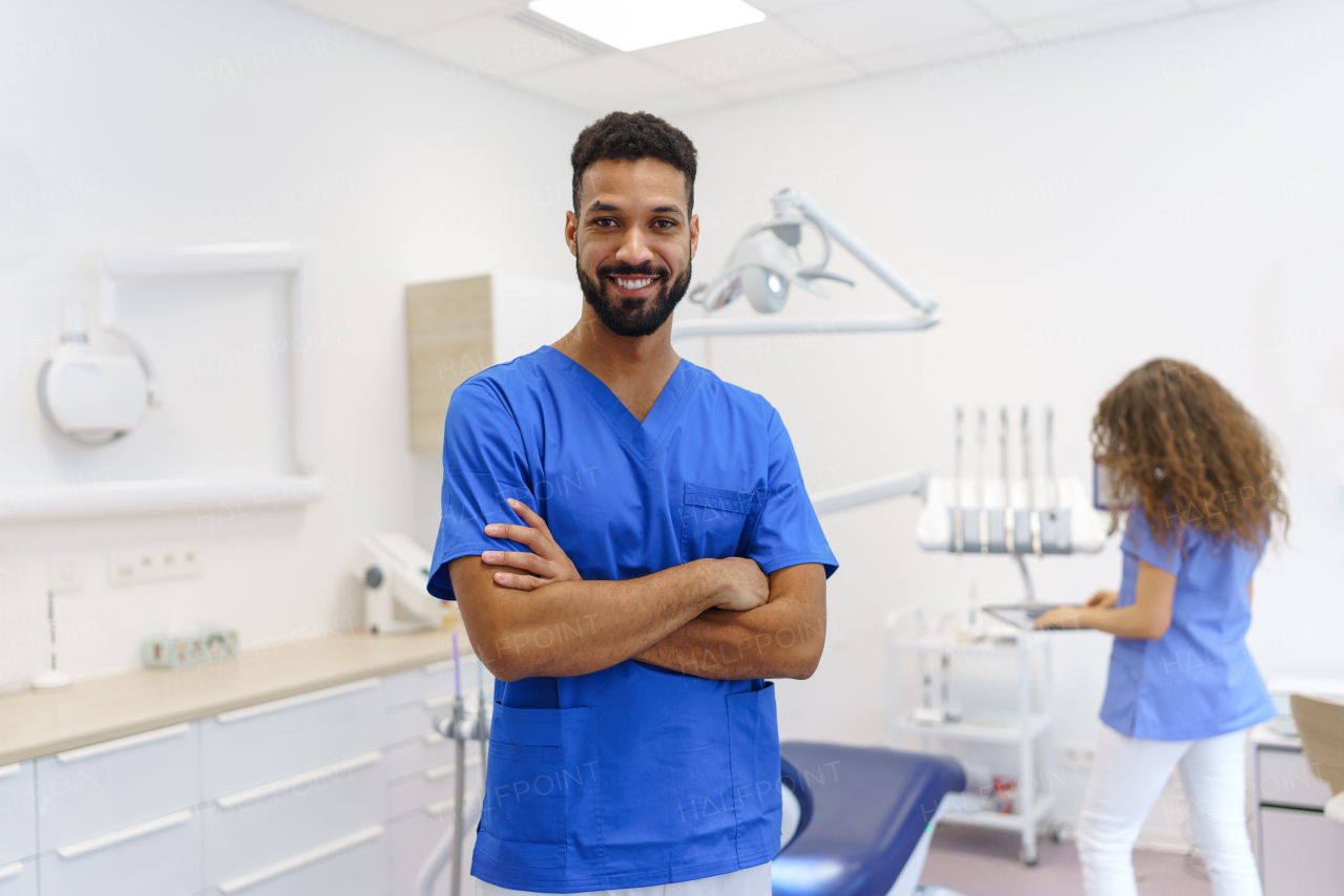 Portrait of young multiracial dentist at a private dental clinic.