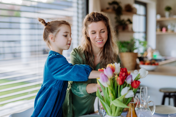 Little girl with her mother celebrating easter.