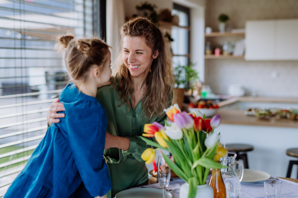 Little girl with her mother celebrating easter.