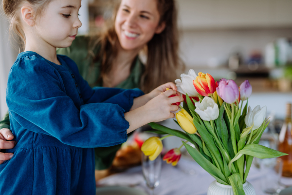 Little girl with her mother celebrating easter.