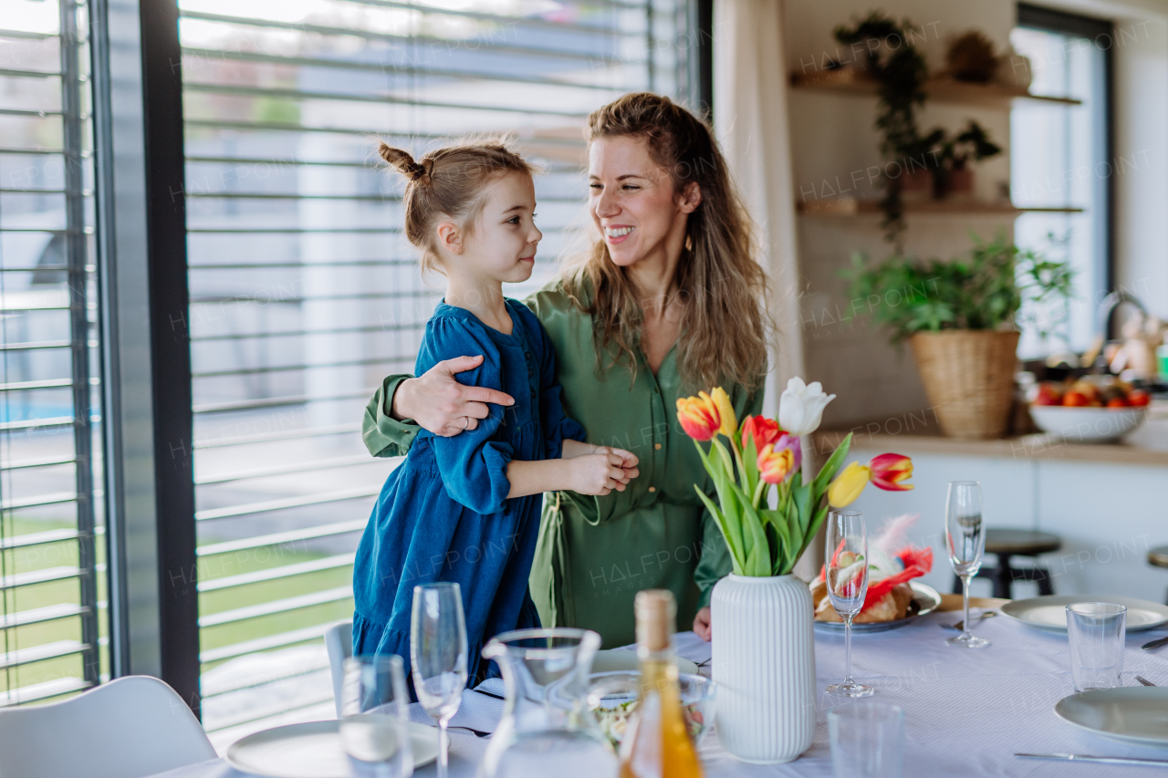 Little girl with her mother celebrating easter.