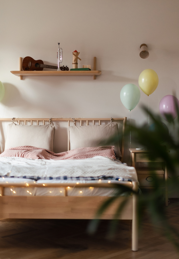 Close up of a childrens bedroom with balloons.