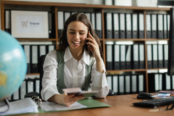 Young businesswoman working and calling in the office.