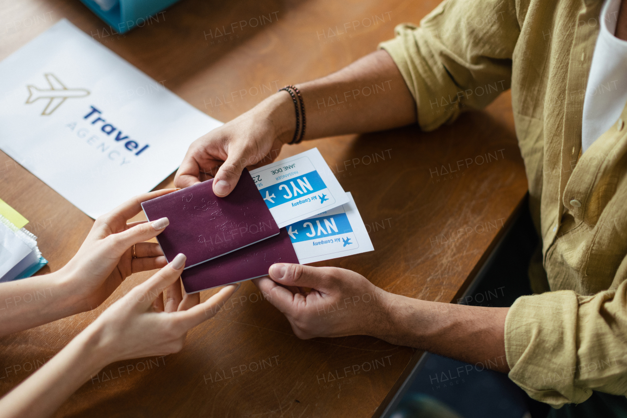 Top view of a plane tickets in travel agency.