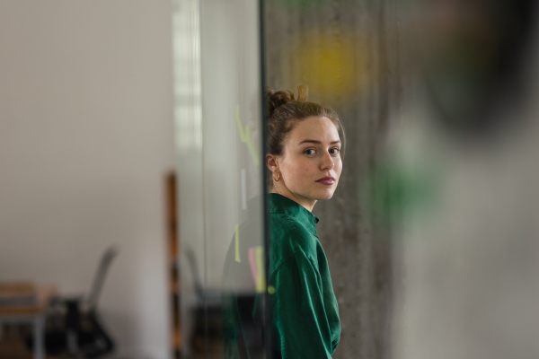 Portrait of young woman in the office.