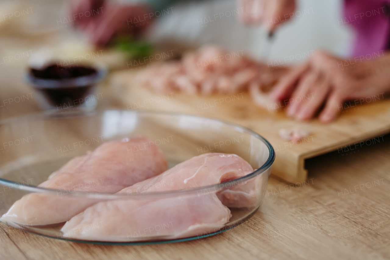 Close-up of the raw meat during cooking.