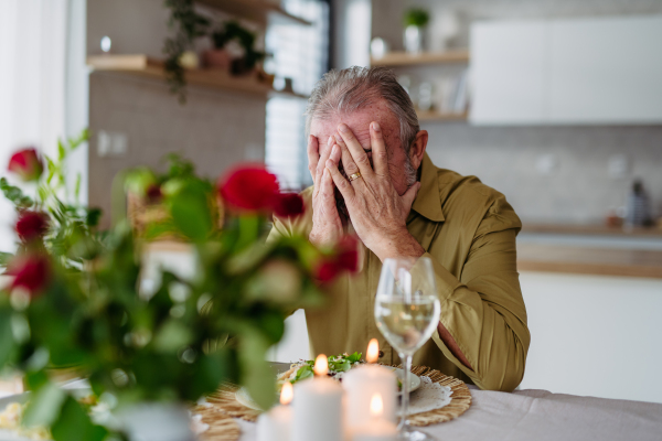 Senior man waiting for her wife for celebrating her birthday.