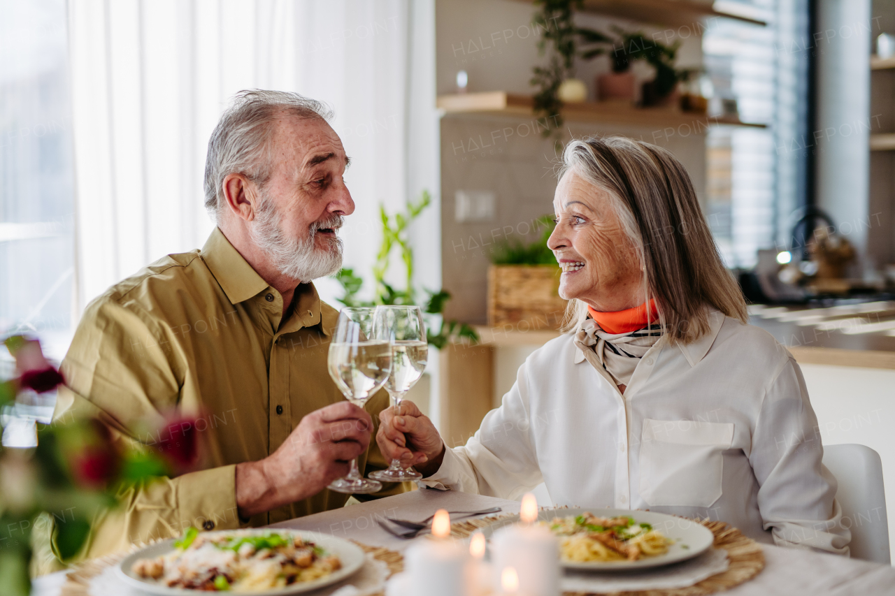 Senior man with his wife celebrating anniversary together.