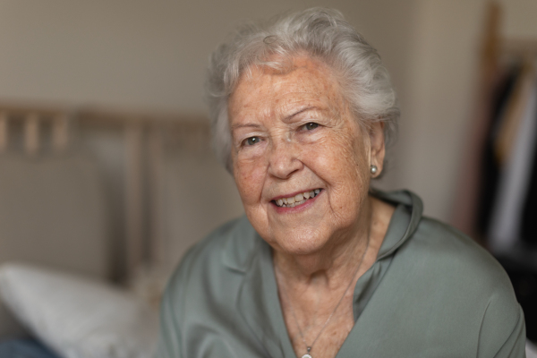 Portrait of a senior woman in the pajama.