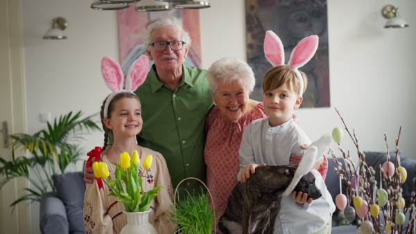 Easter video of grandparents with grandchildren before traditional easter lunch. Recreating family traditions and customs. Concept of family easter holidays.