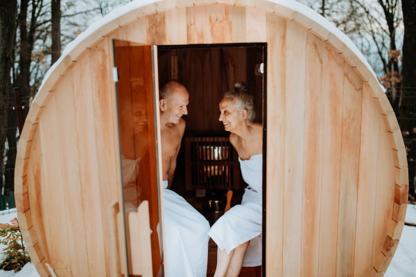 Senior couple enjoying together time in sauna, relax, spa and healthy lifestlye concept.