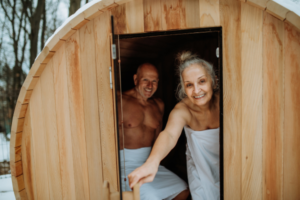 Senior couple enjoying together time in sauna, relax, spa and healthy lifestlye concept.