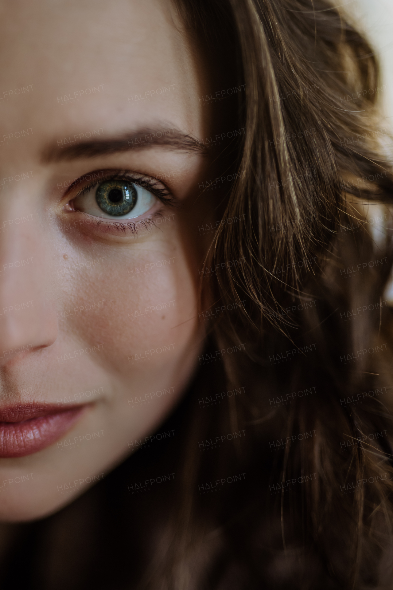 Portrait of a young beautiful woman with natural make-up.