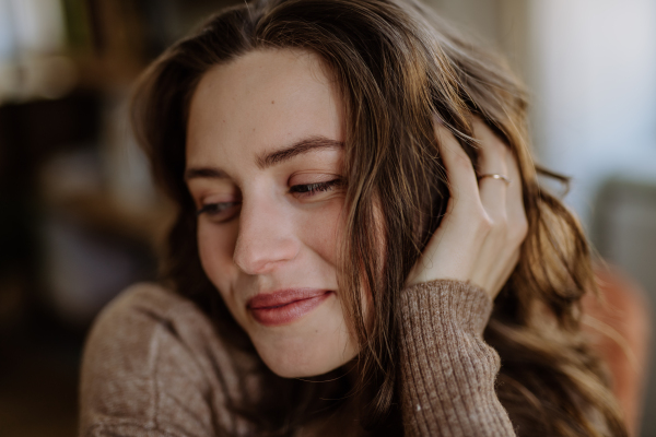 Portrait of a young beautiful woman with natural make-up.