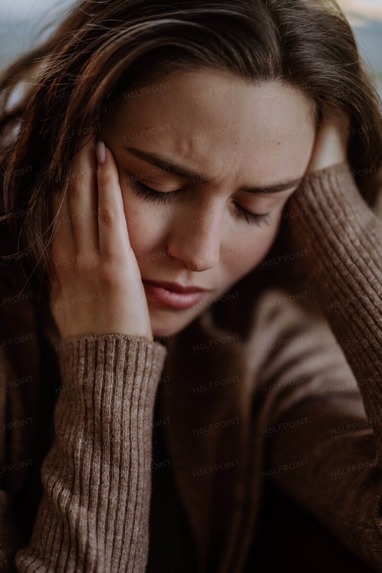 Portrait of an unhappy young woman, concept of mental health.