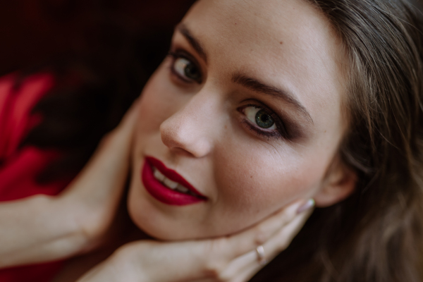 Portrait of an young woman with evening make-up.