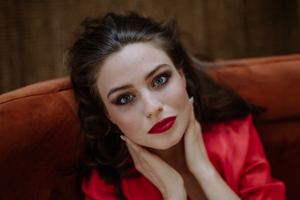 Top view of an young woman with evening make-up.