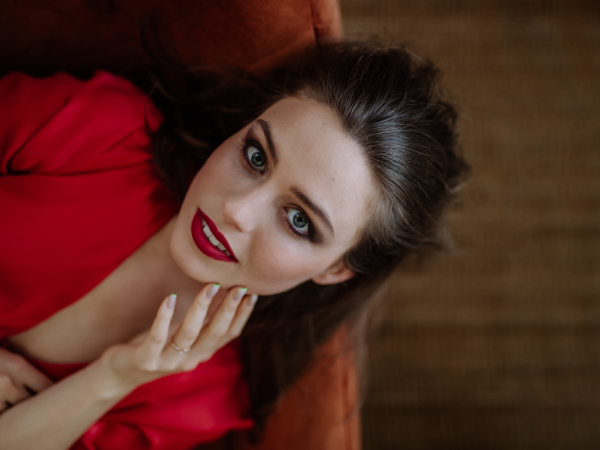 Top view of an young woman with evening make-up.