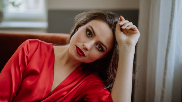 Portrait of an young woman with evening make-up.