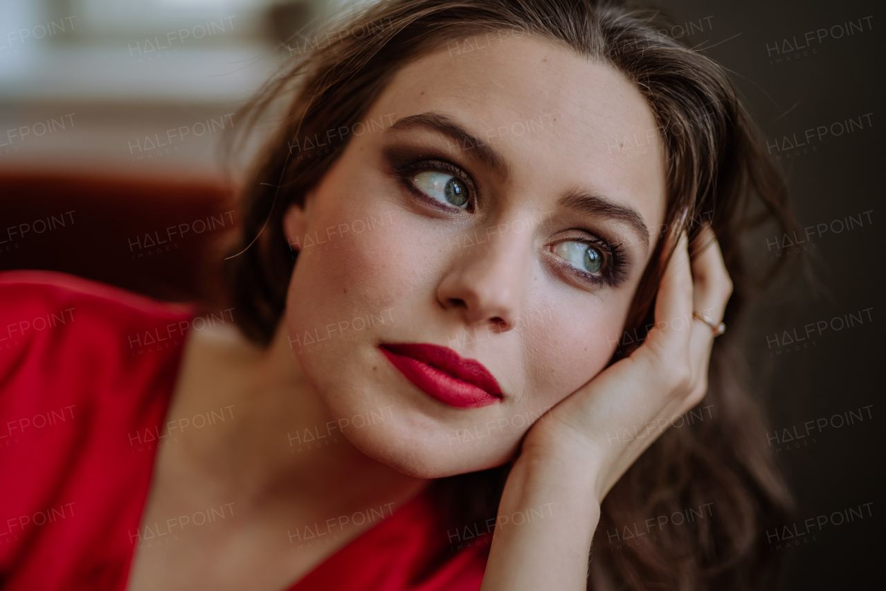 Portrait of an young woman with evening make-up.