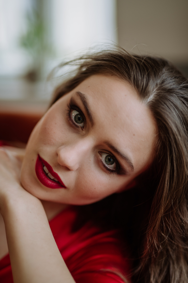 Portrait of an young woman with evening make-up.