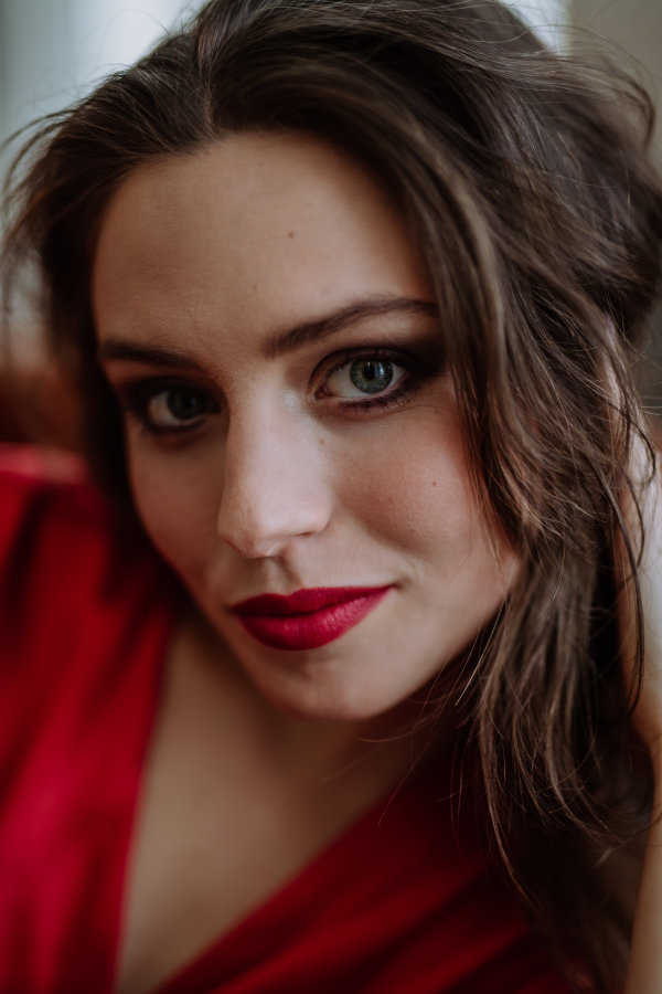 Portrait of an young woman with evening make-up.