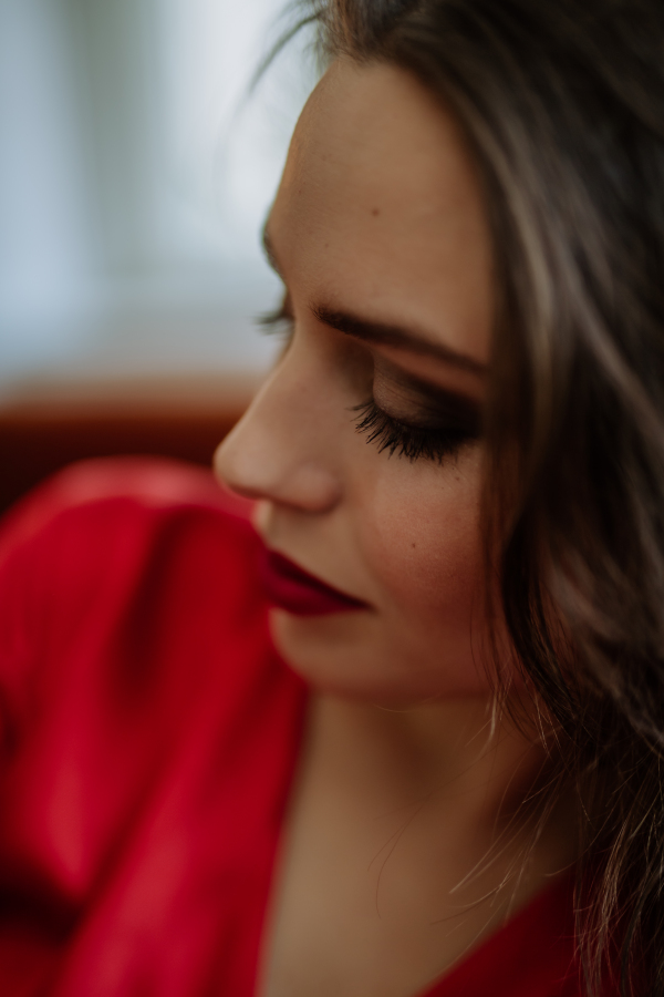 Portrait of an young woman with evening make-up.