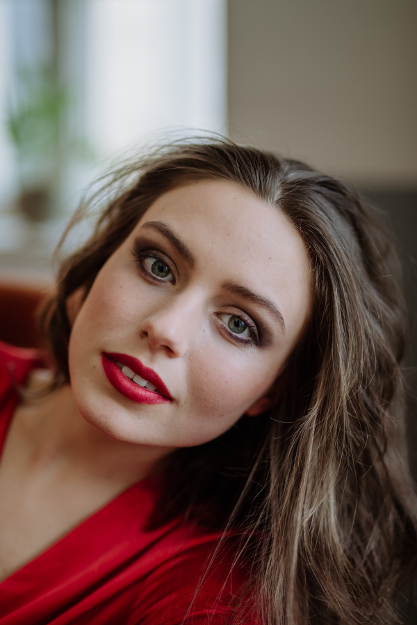 Portrait of an young woman with evening make-up.