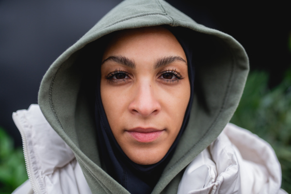 Portrait of a young muslim woman outdoor,looking at camera.