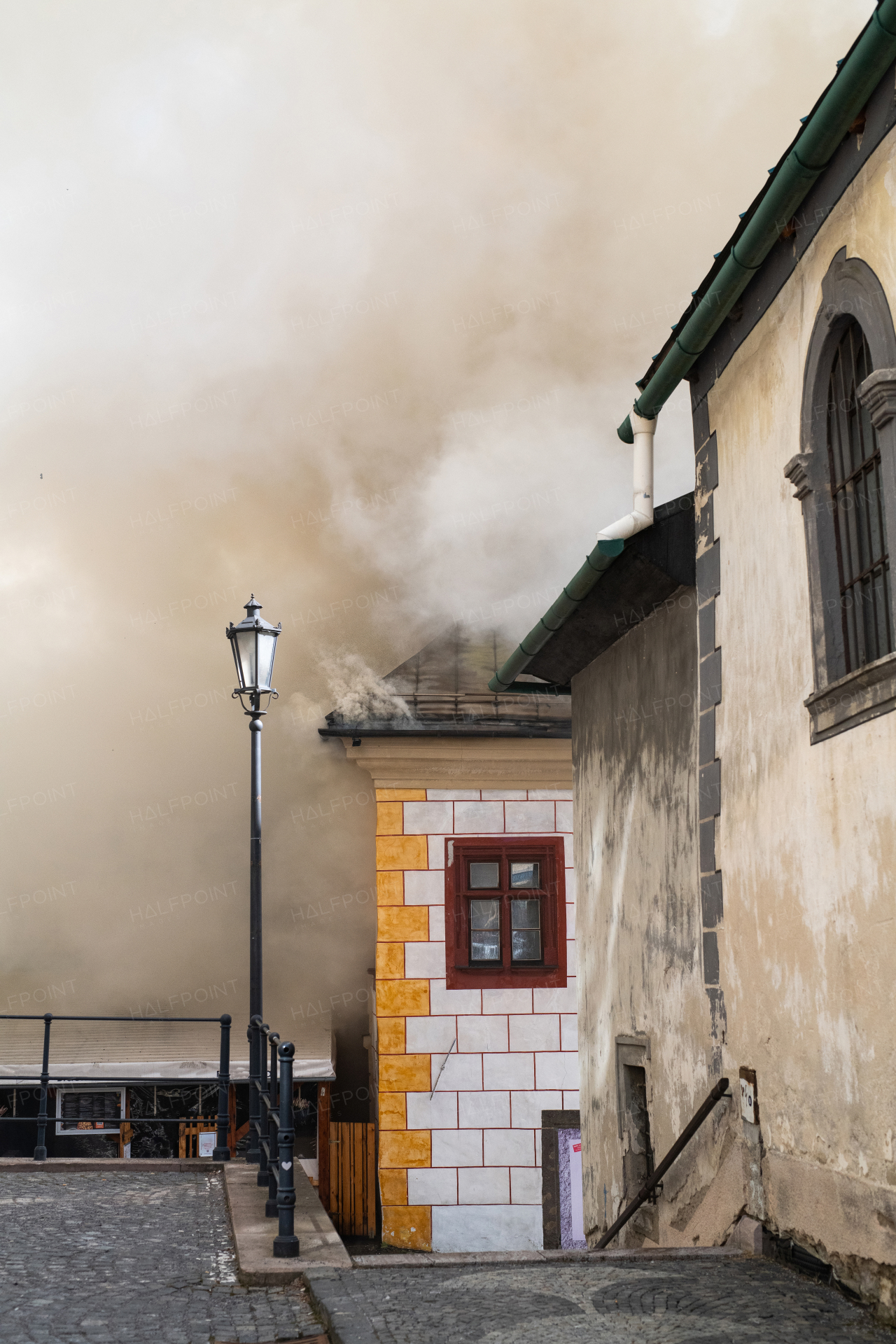 Close up of a burning old city center.