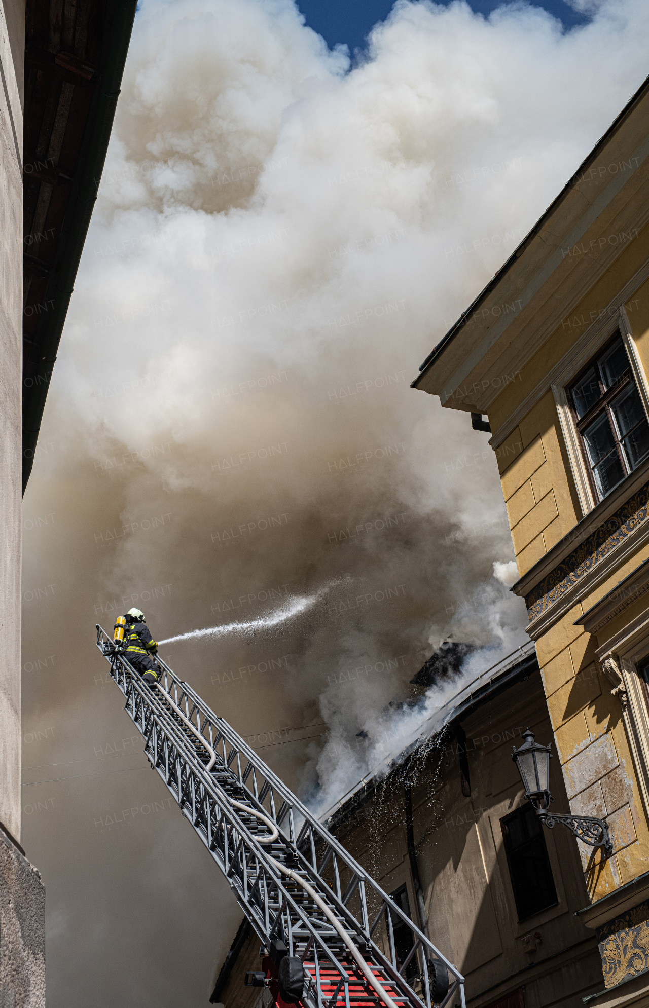 Close up of a burning old city center.