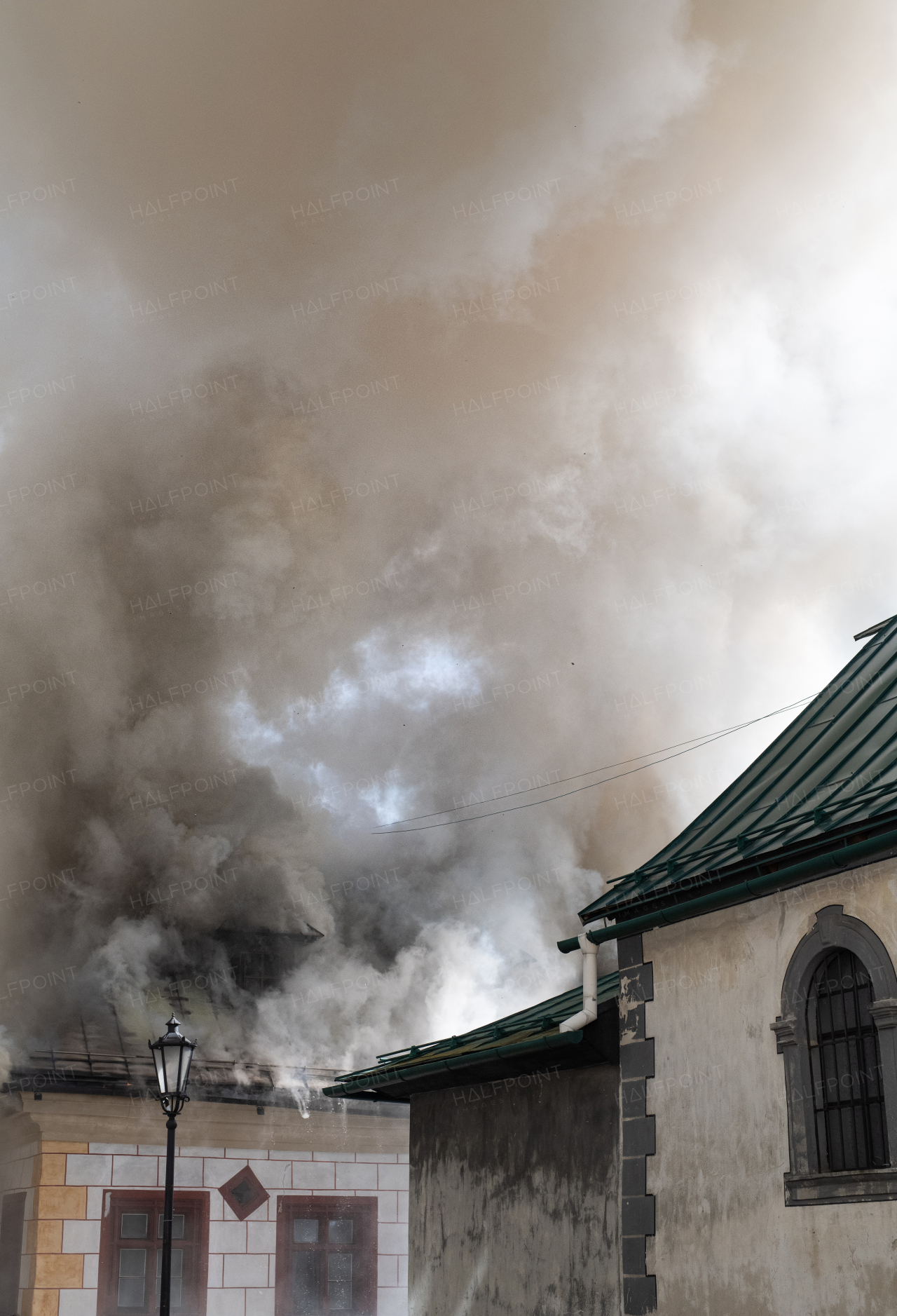 Close up of a burning old city center.