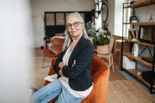 Portrait of a senior woman with busines look.