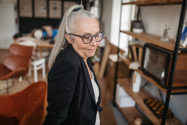 Portrait of a senior woman with busines look.