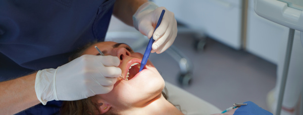 Close-up of dental examination in an ambulance.