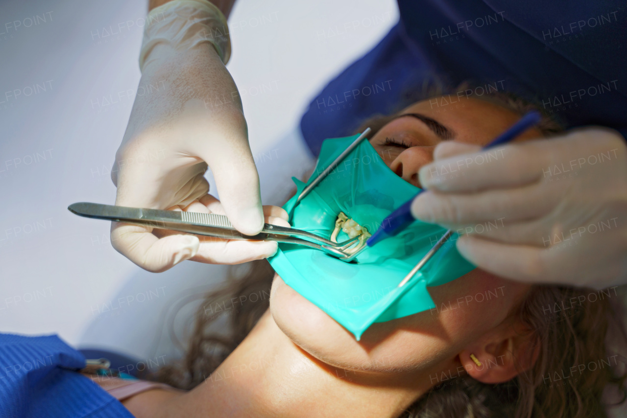 Close-up of young woman at dental examination in an ambulance.